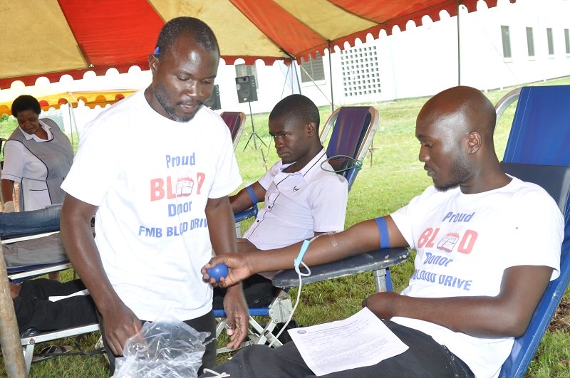 Senior FMB Staff take the lead in blood donations during the 2014 Christmas Blood Drive